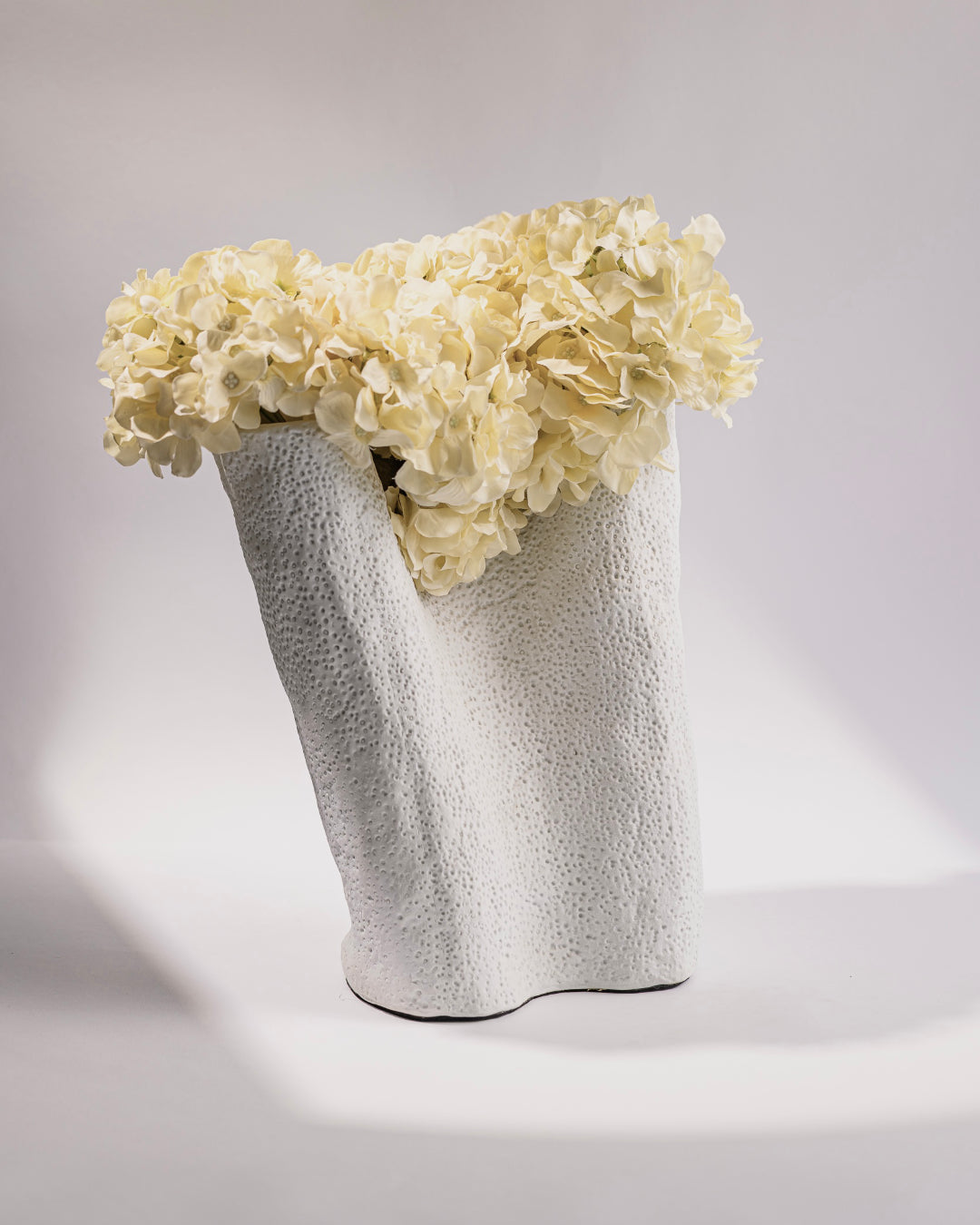 COVED VASES