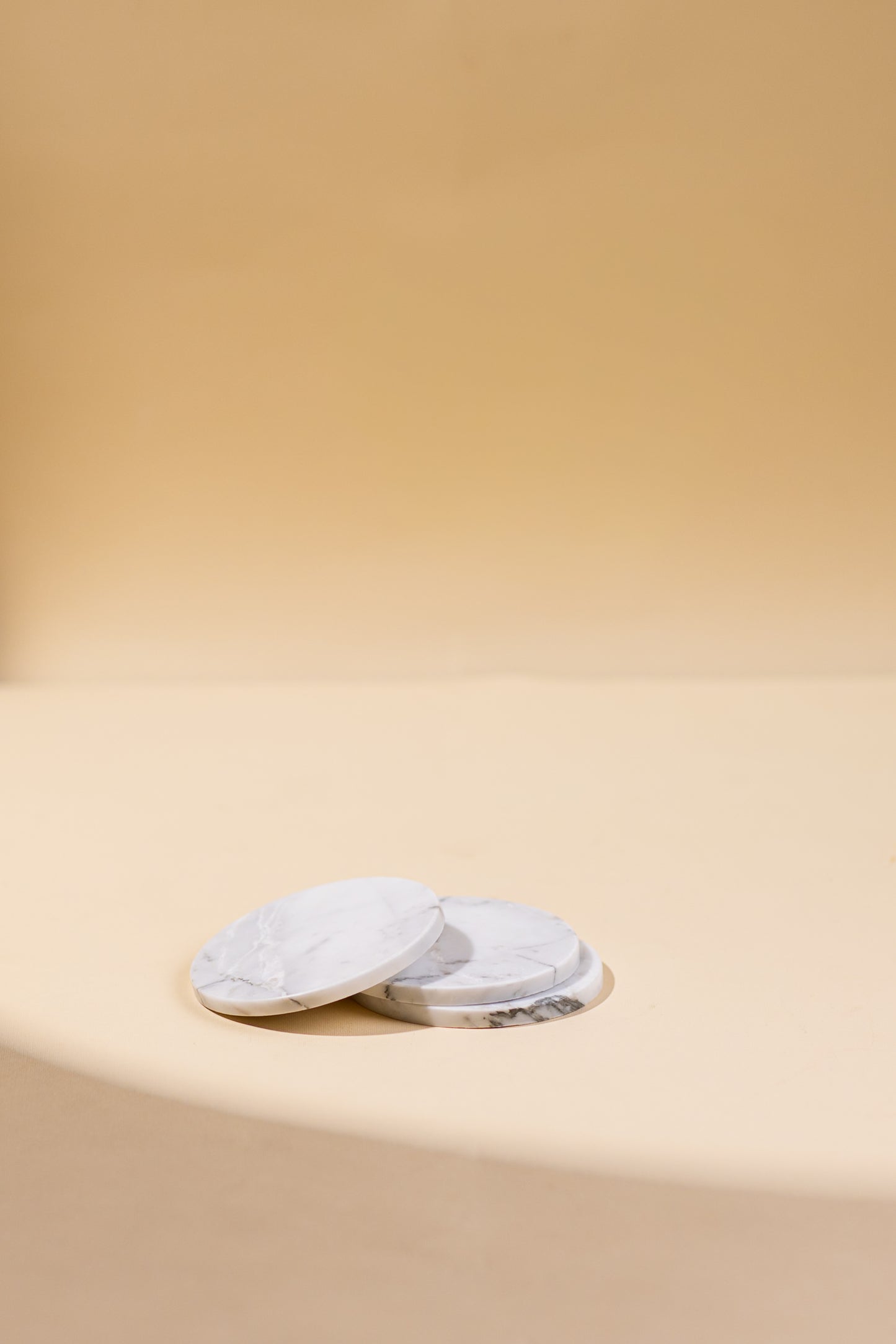 CIRCLE STATUARIO COASTERS